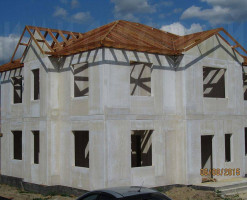 Дом облицован плиткой