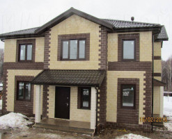 Дом облицован плиткой