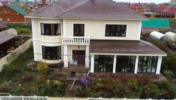 Коттедж с зимним садом и летней кухней