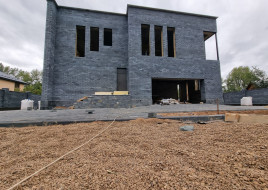 Коттедж с плоской кровлей в стиле "хай-тек"